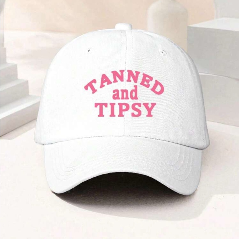 White Cap with Pink 'Tanned and Tipsy' Text